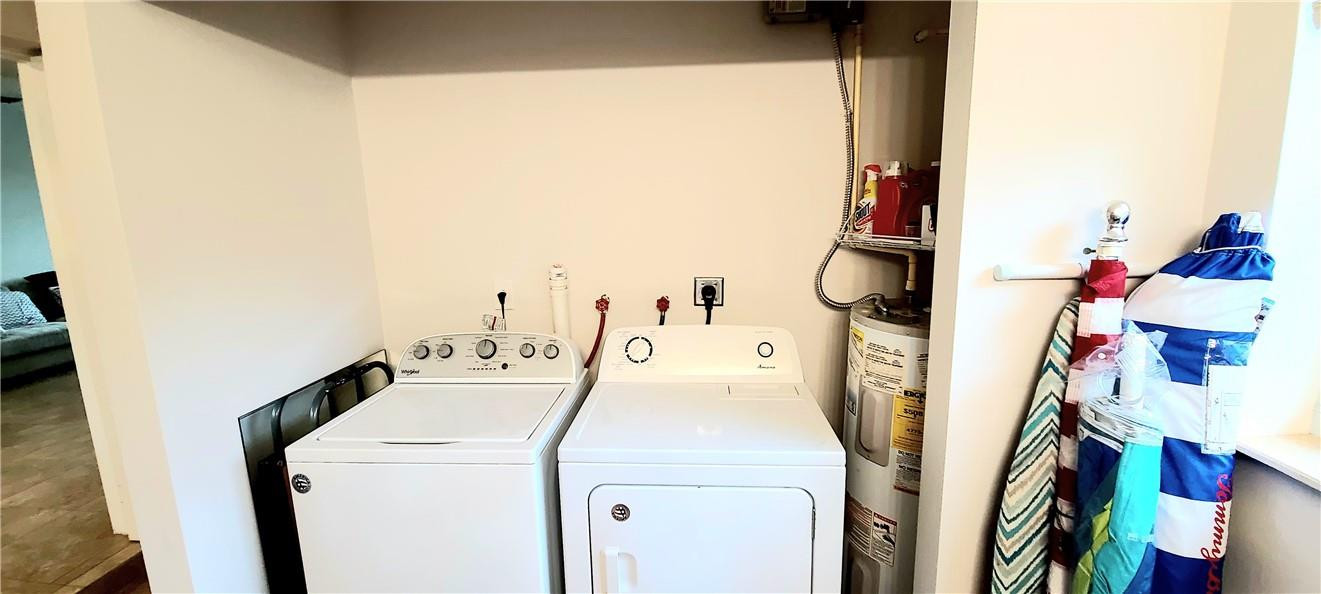 361 Northwest 37th Street Pompano Beach, FL 33064 - Photo 9 of 21 a utility room with dryer and washer