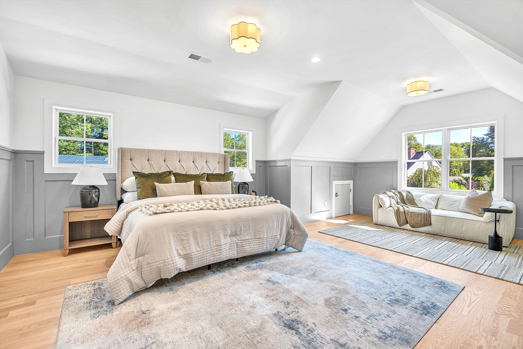 25 Euclid Avenue Natick, MA 01760 - Photo 15 of 41 a bedroom with a bed and a couch