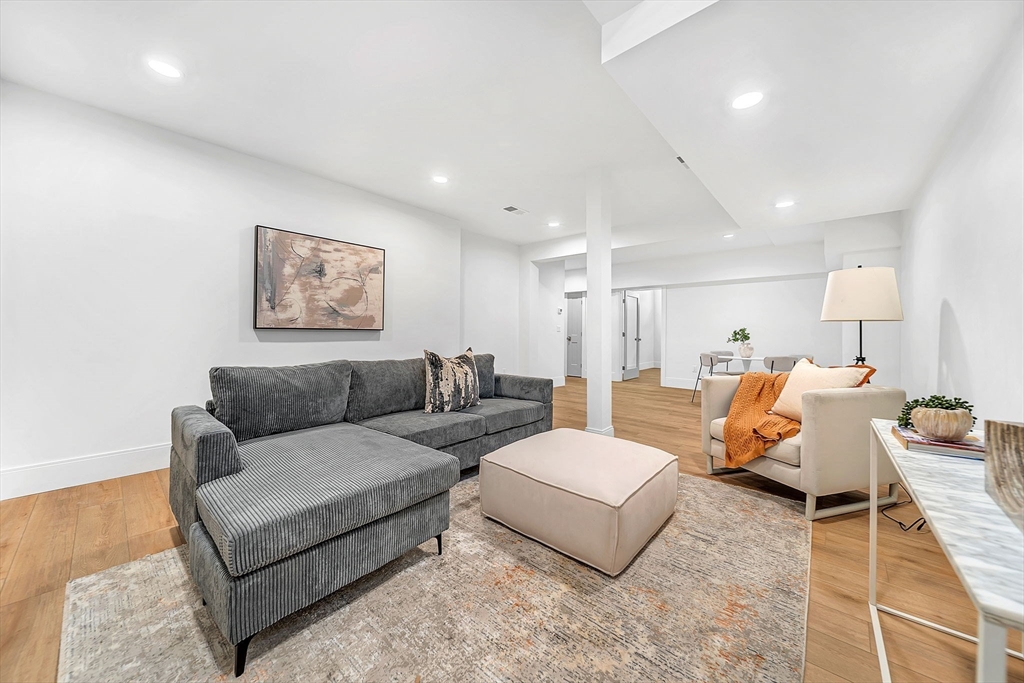 25 Euclid Avenue Natick, MA 01760 - Photo 31 of 41 a living room with furniture and white walls