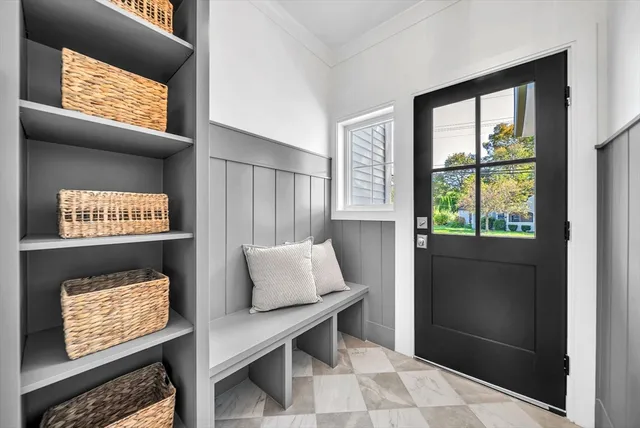 a view of room with window and furniture