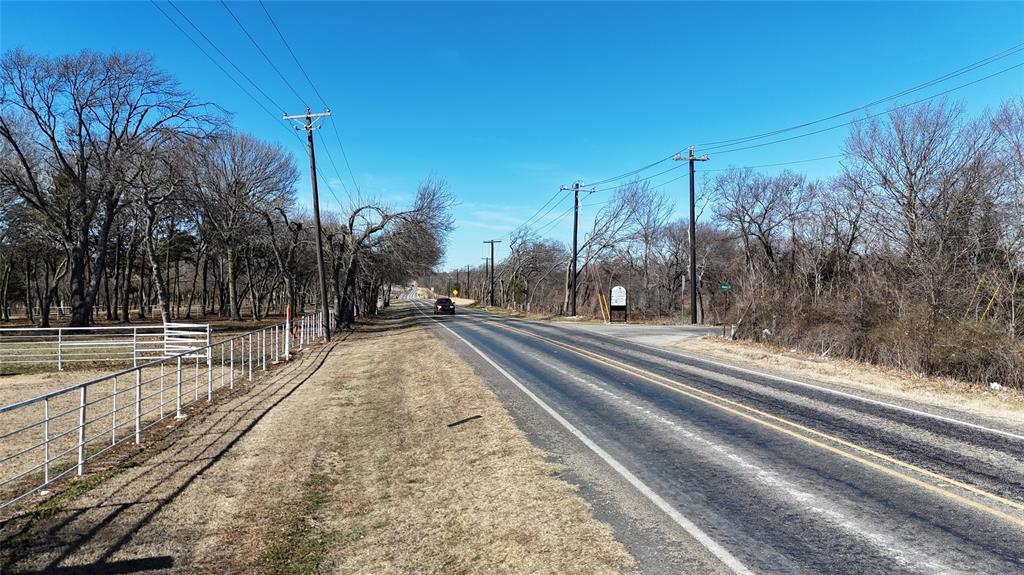 121 Sec Road Gunter, TX 75058 - Photo 37 of 40 a view of a swimming pool with a yard