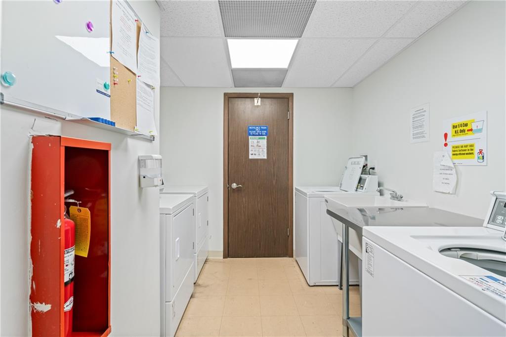 5600 Munhall Road, Unit 606 Pittsburgh, PA 15217 - Photo 15 of 19 a utility room with dryer and washer