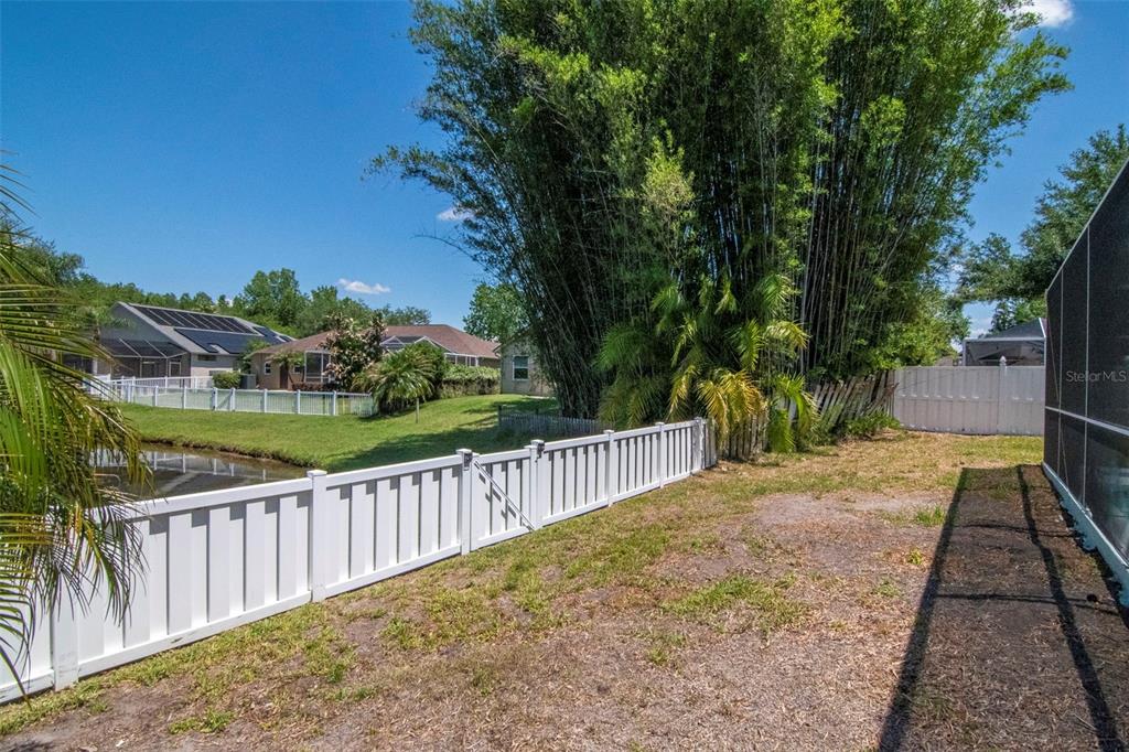 19103 Wind Dancer Street Lutz, FL 33558 - Photo 41 of 41 a view of a pathway with a wrought fence