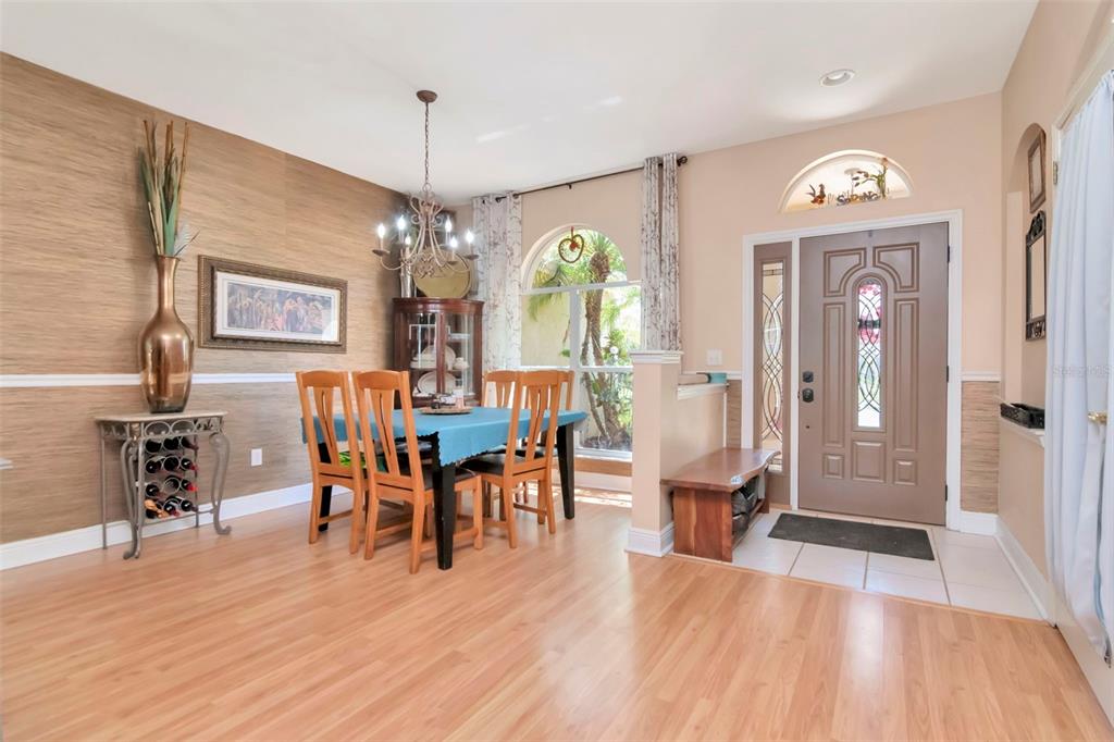 19103 Wind Dancer Street Lutz, FL 33558 - Photo 6 of 41 a view of a dining room with furniture window and wooden floor