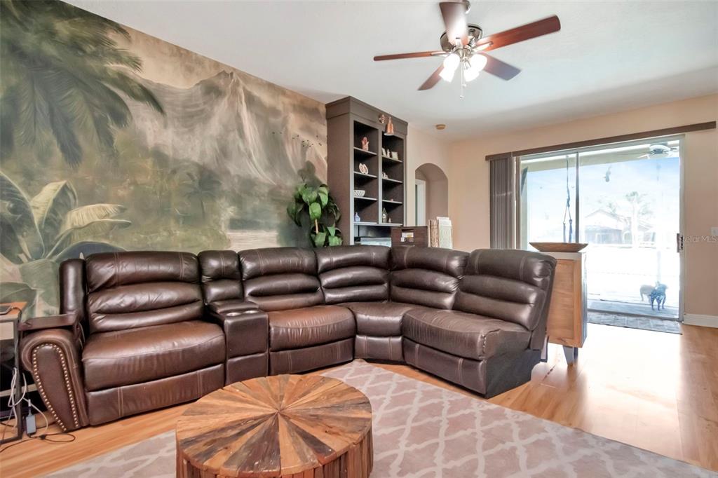 19103 Wind Dancer Street Lutz, FL 33558 - Photo 8 of 41 a living room with furniture and a large window