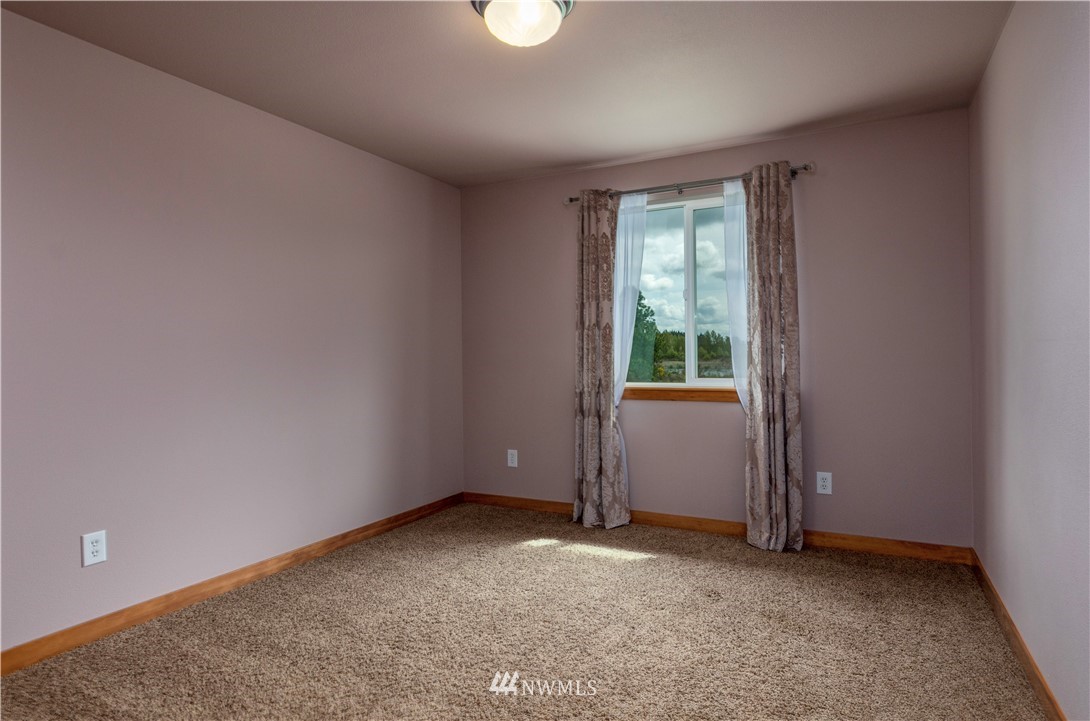 6519 190th Trail Southwest Rochester, WA 98579 - Photo 27 of 40 an empty room with windows