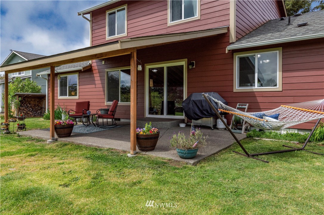 6519 190th Trail Southwest Rochester, WA 98579 - Photo 30 of 40 a front view of a house with patio