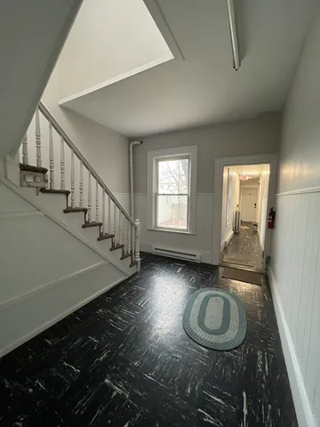 a view of a living room with a wooden roof