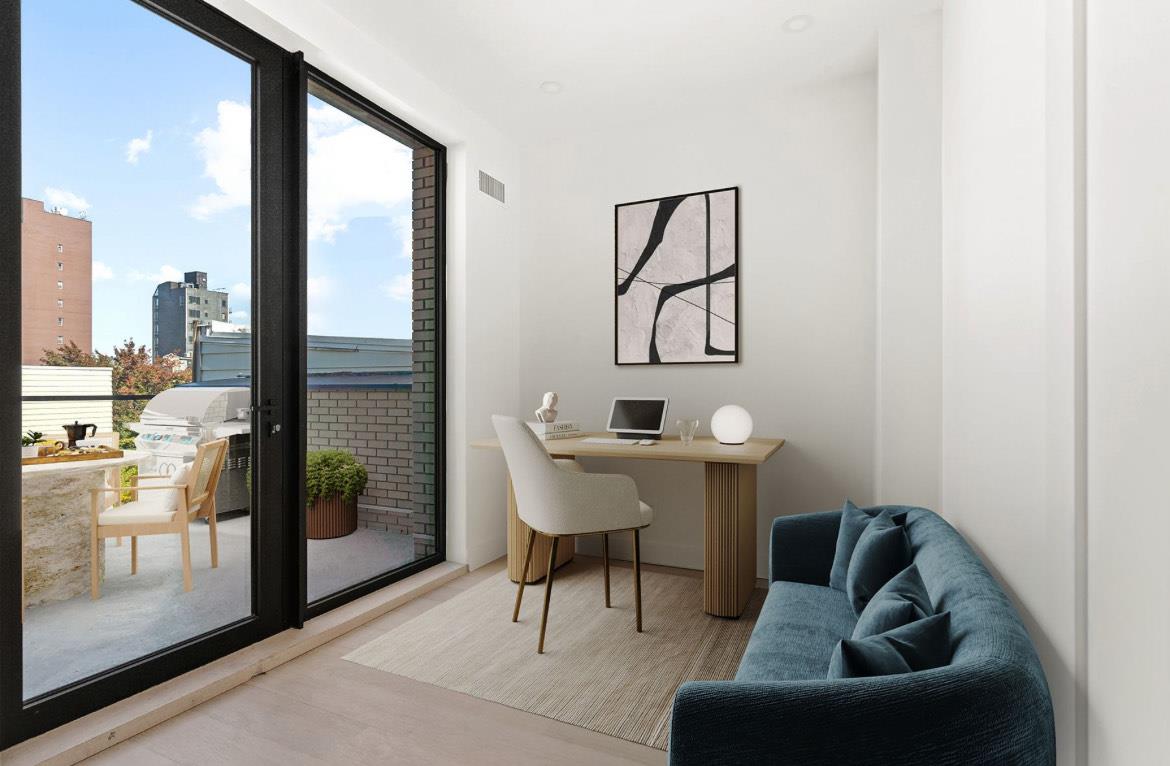 204 Withers Street, Unit 3A Brooklyn, NY 11211 - Photo 9 of 13 a living room with furniture and a floor to ceiling window