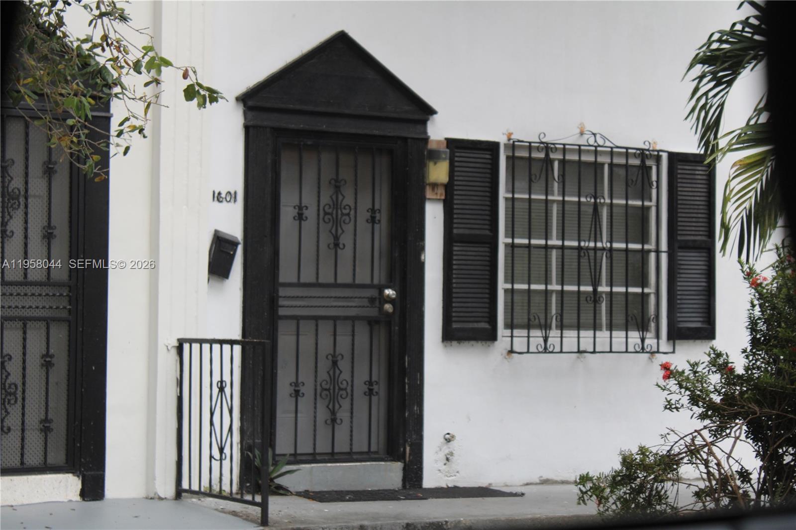 1601 Northwest 81st Street, Unit 1601 Miami, FL 33147 - Photo 12 of 13 a view of front door