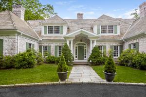 741 Hollow Tree Ridge Road Darien, CT 06820 - Photo 2 of 60 front view of a house with a garden