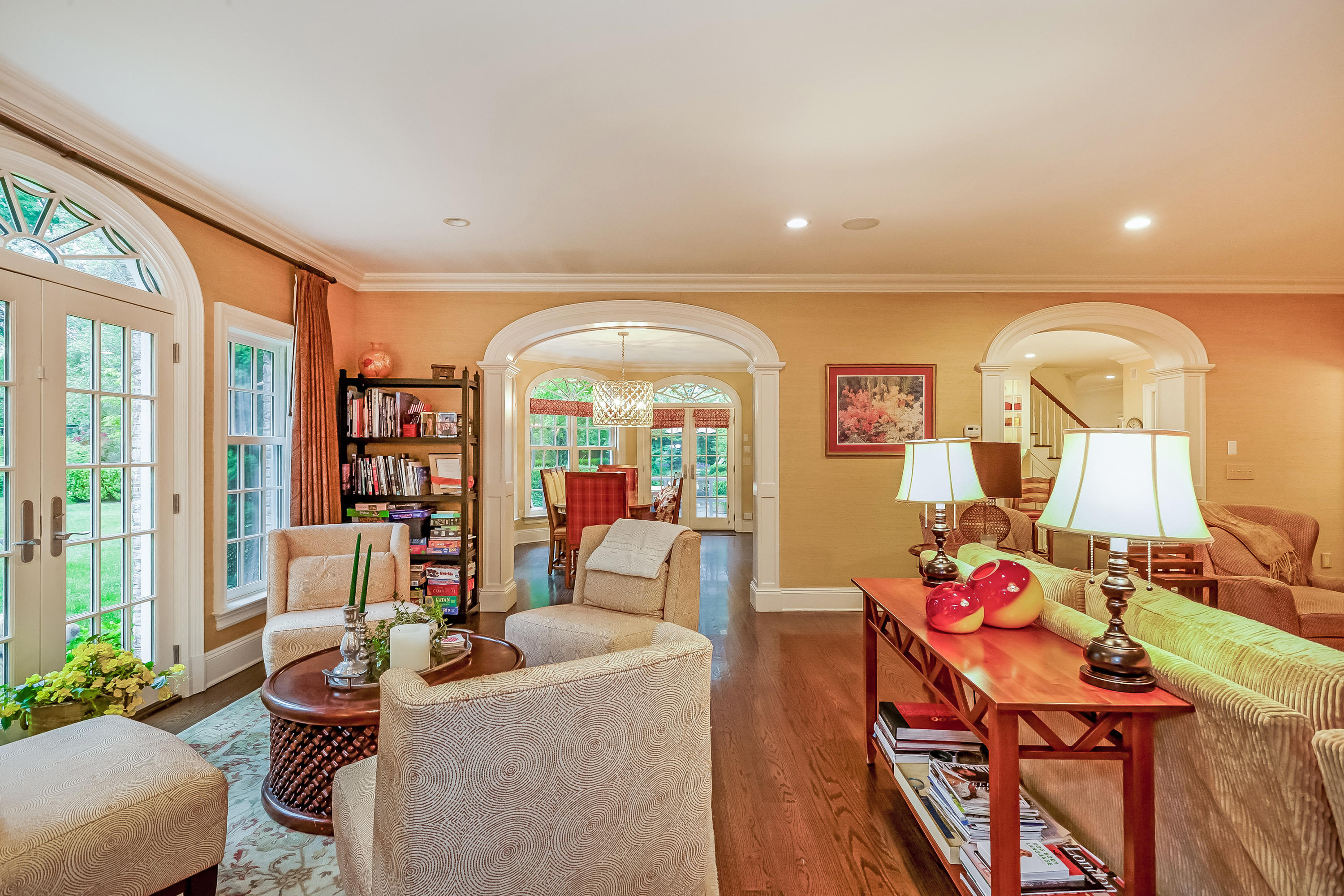 741 Hollow Tree Ridge Road Darien, CT 06820 - Photo 14 of 60 a living room with fireplace furniture and a large window