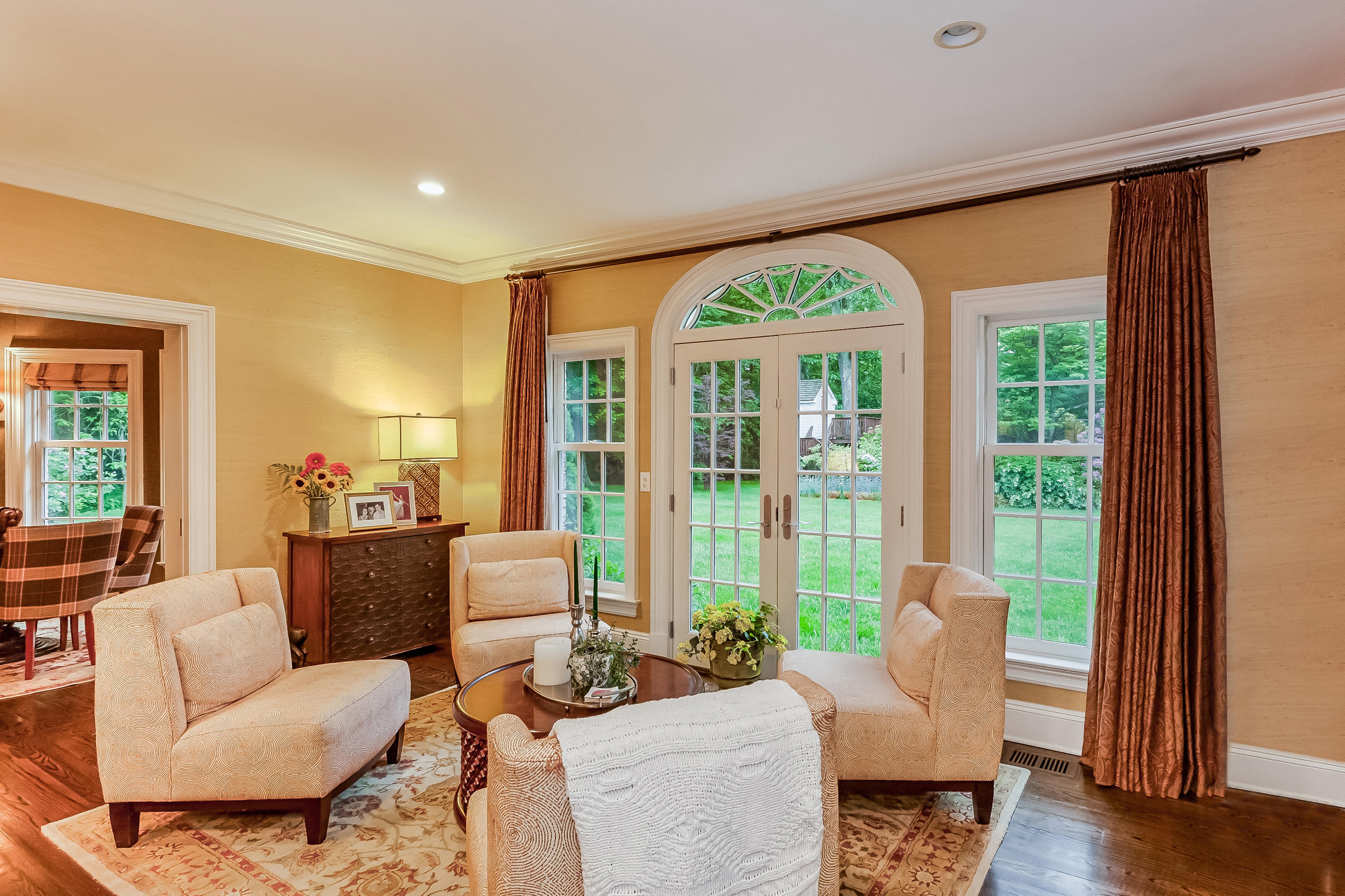 741 Hollow Tree Ridge Road Darien, CT 06820 - Photo 17 of 60 a living room with furniture and a large window