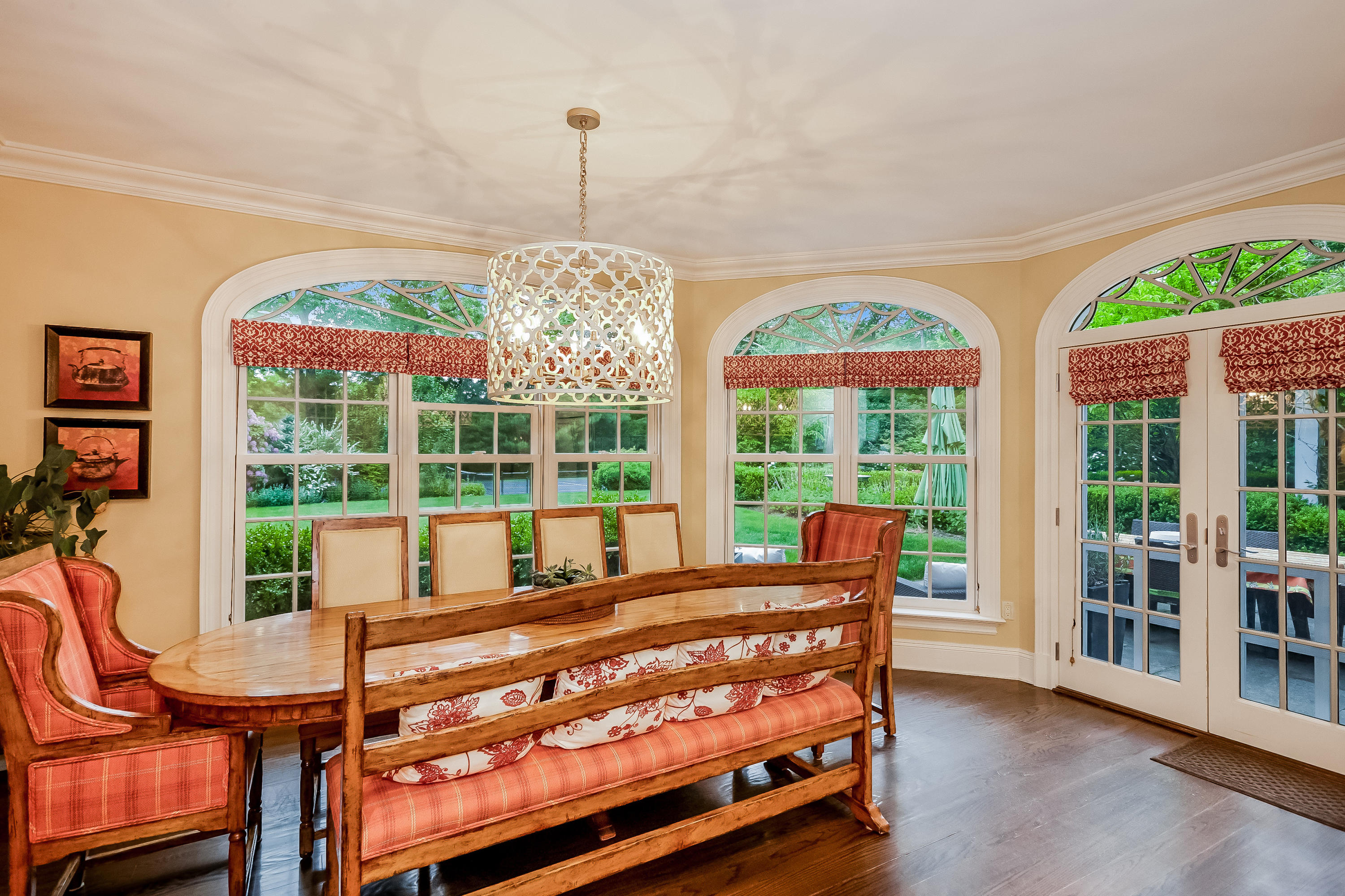 741 Hollow Tree Ridge Road Darien, CT 06820 - Photo 21 of 60 a living room with furniture and a chandelier