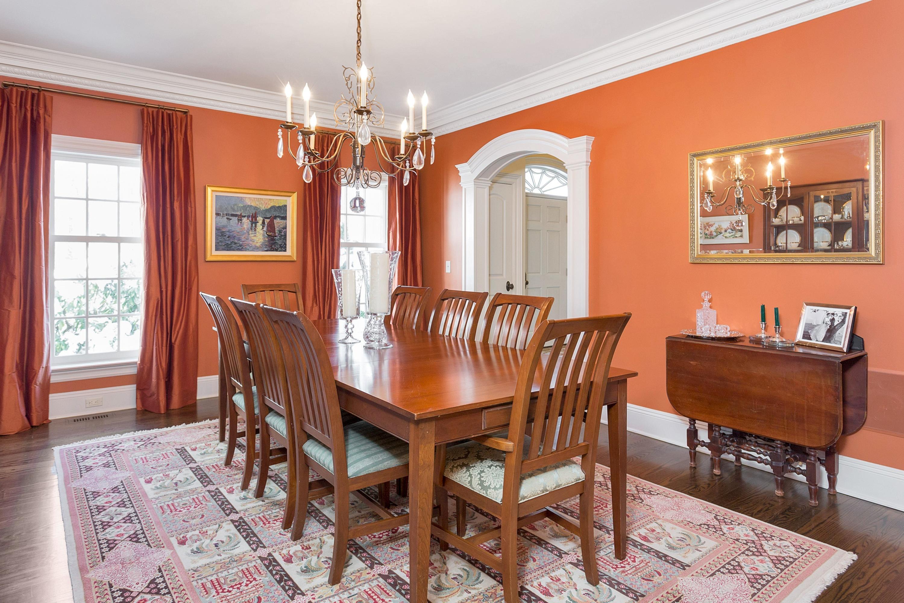 741 Hollow Tree Ridge Road Darien, CT 06820 - Photo 27 of 60 a view of a dining room with furniture and chandelier