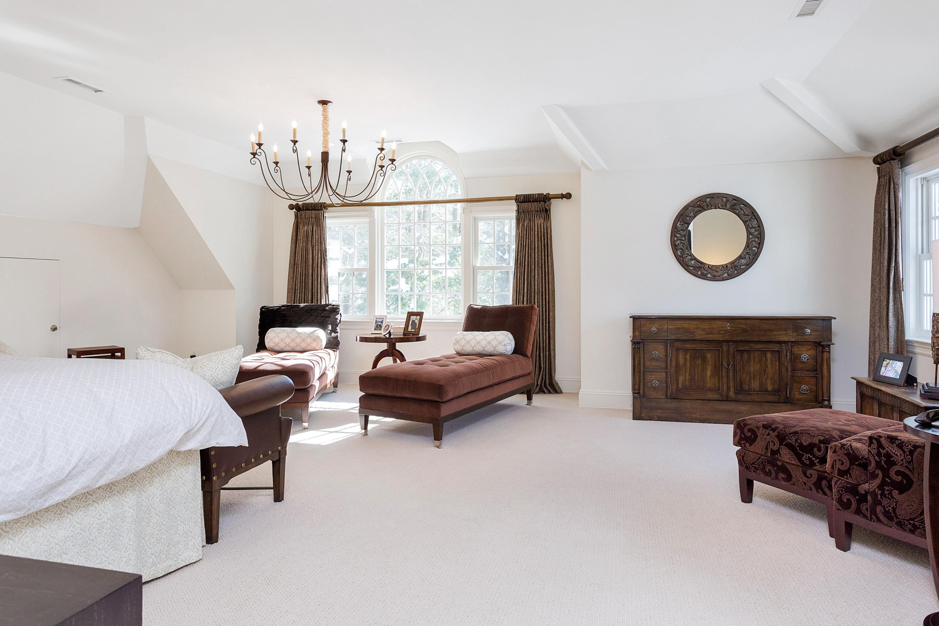 741 Hollow Tree Ridge Road Darien, CT 06820 - Photo 31 of 60 a living room with furniture and a fireplace