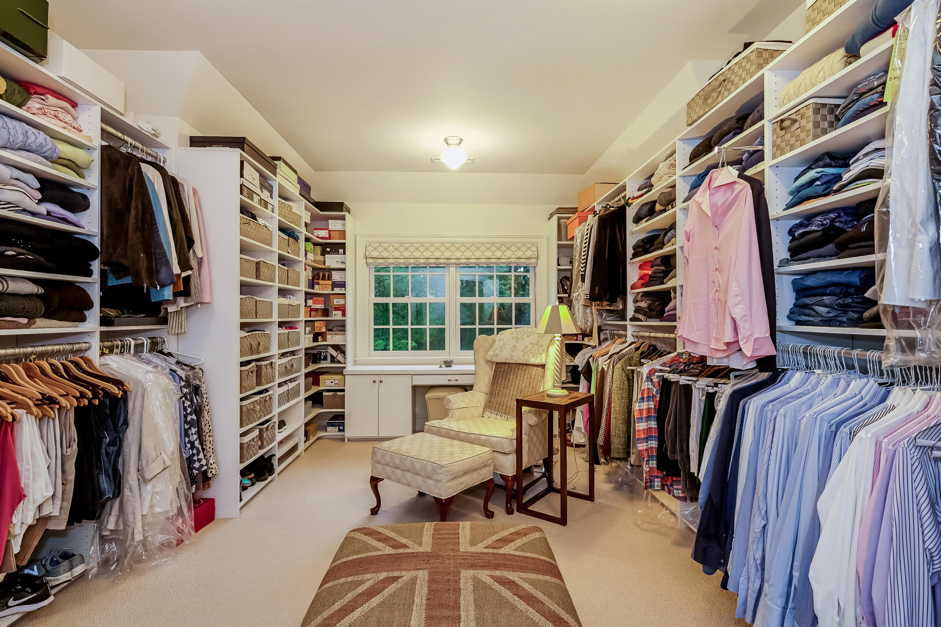 741 Hollow Tree Ridge Road Darien, CT 06820 - Photo 35 of 60 a view of walk in closet with clothes and shoes