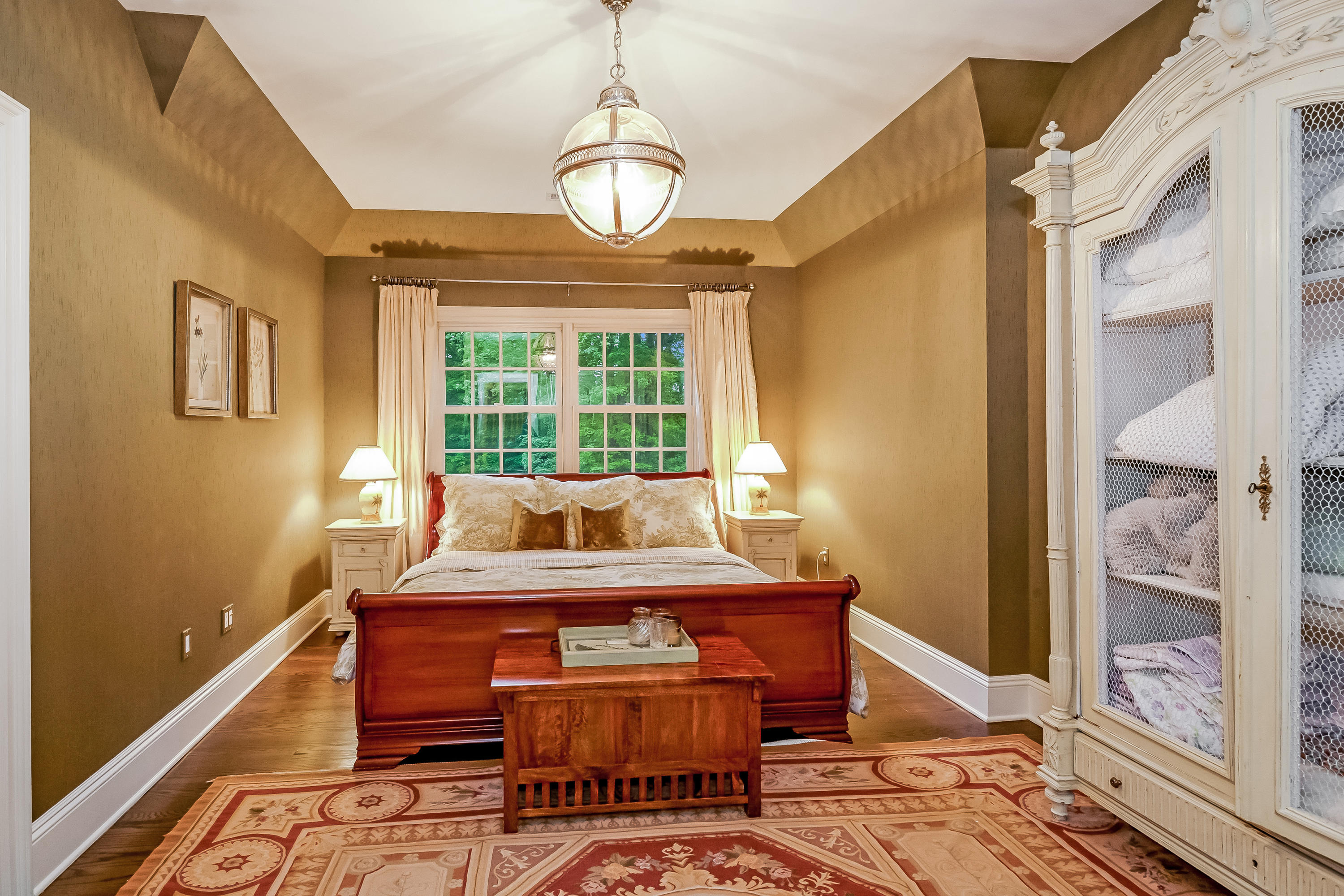 741 Hollow Tree Ridge Road Darien, CT 06820 - Photo 36 of 60 a view of a dining room with furniture window and wooden floor