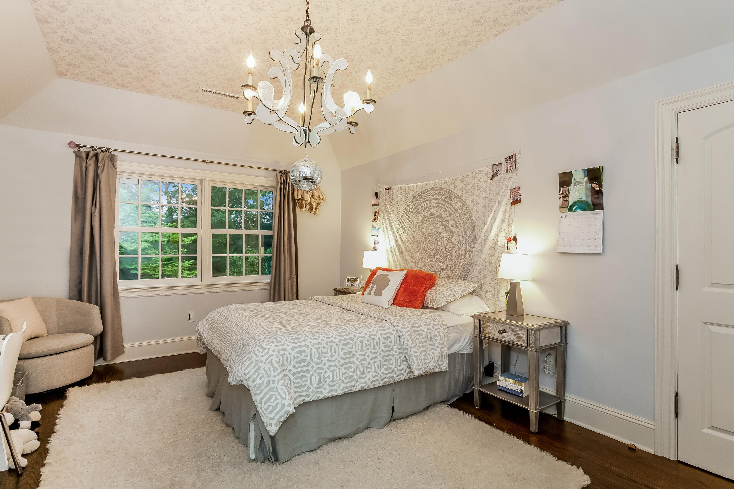 741 Hollow Tree Ridge Road Darien, CT 06820 - Photo 37 of 60 a bedroom with a bed couch and a window