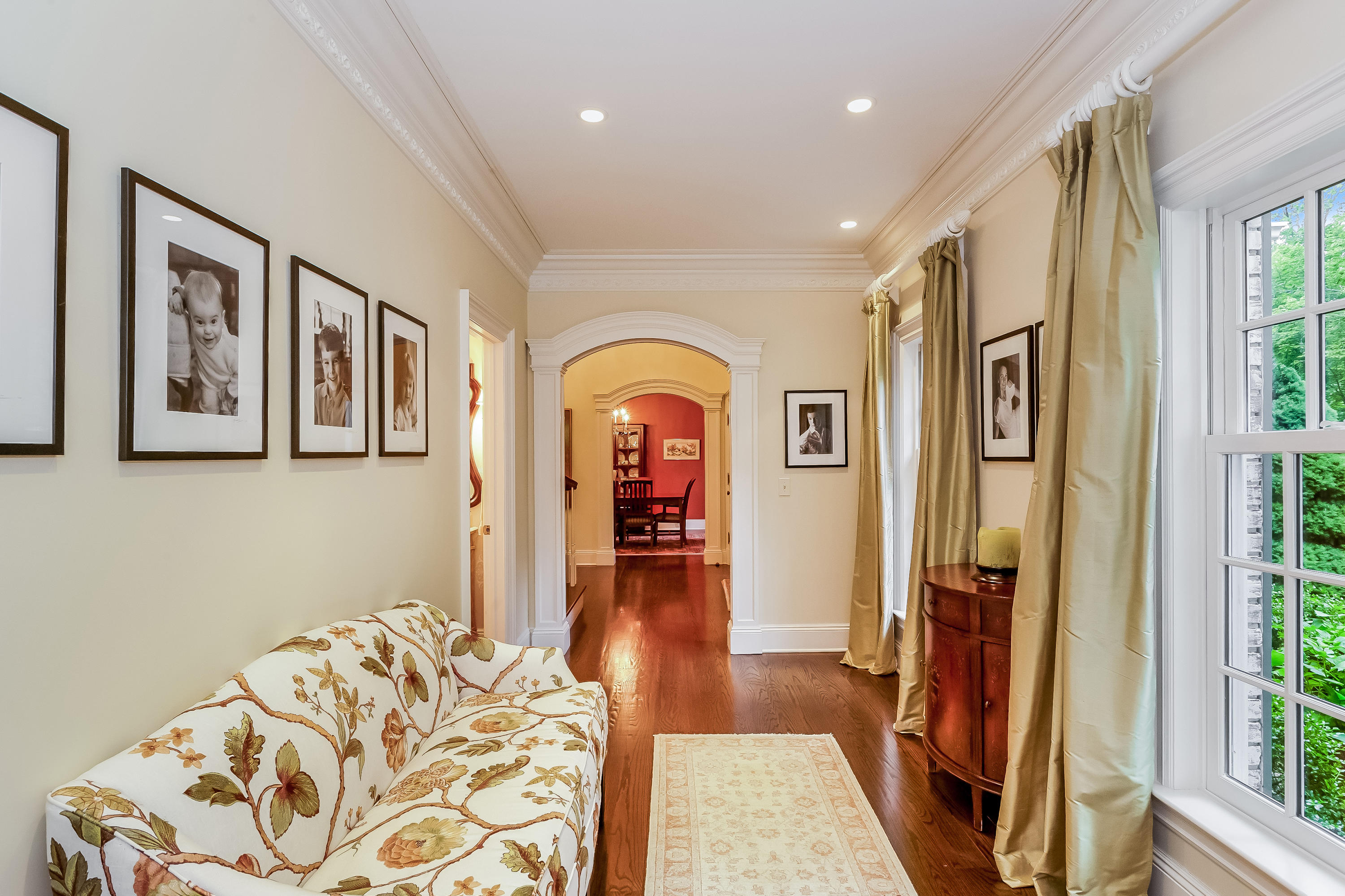 741 Hollow Tree Ridge Road Darien, CT 06820 - Photo 5 of 60 a view of a hallway with furniture and window
