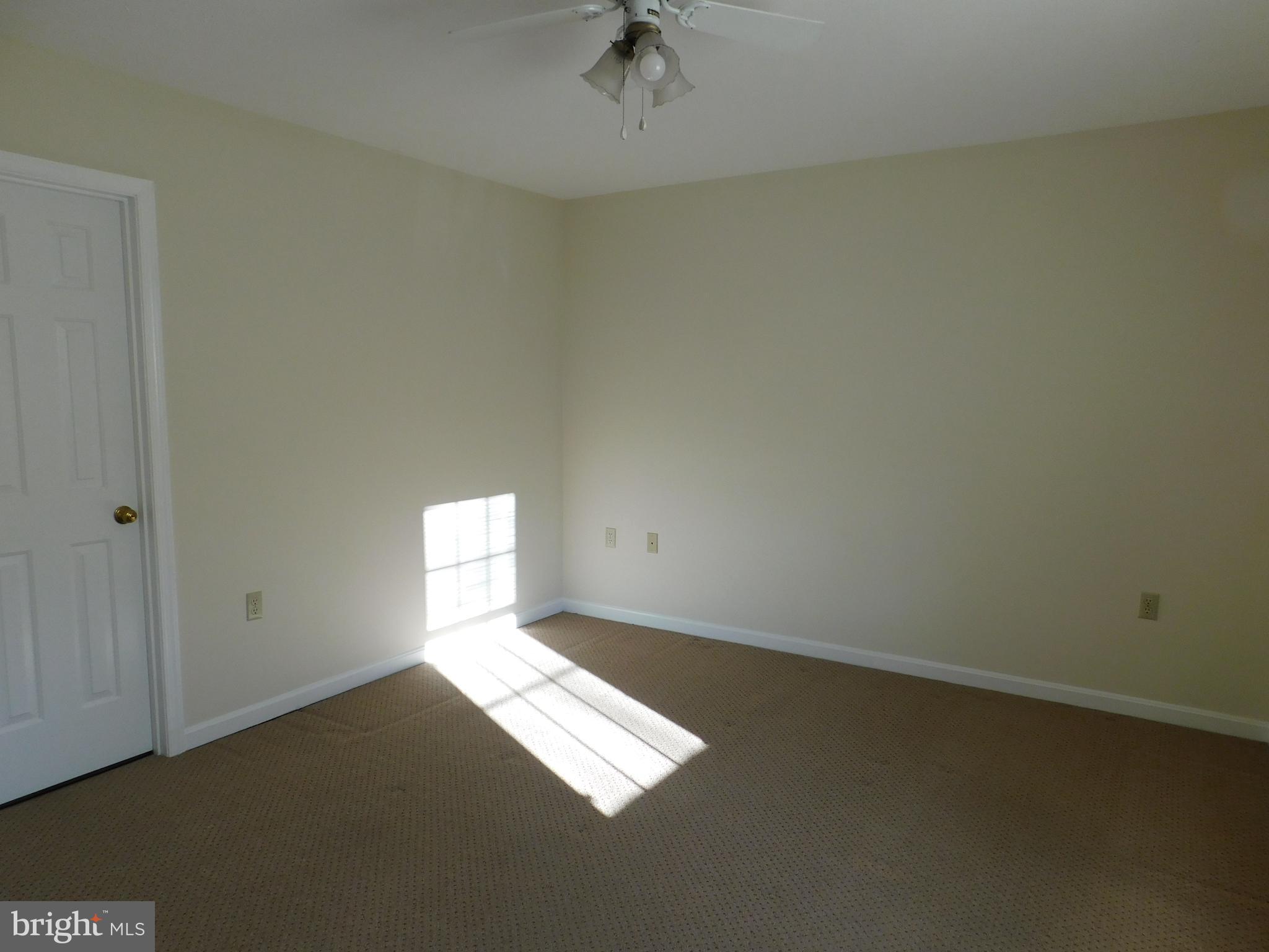 2918 Packer Street Winchester, VA 22601 - Photo 3 of 12 an empty room with a window
