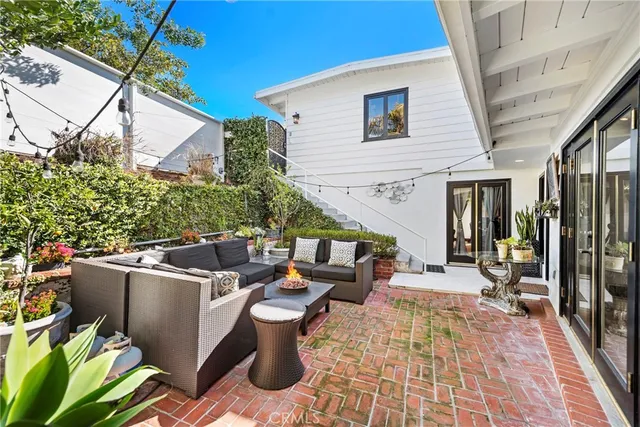 a kitchen with appliances cabinets and a sink
