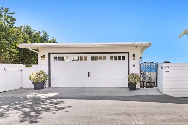 a kitchen with stainless steel appliances granite countertop sink stove and refrigerator