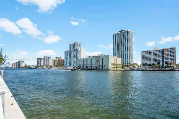 a view of a city with tall buildings