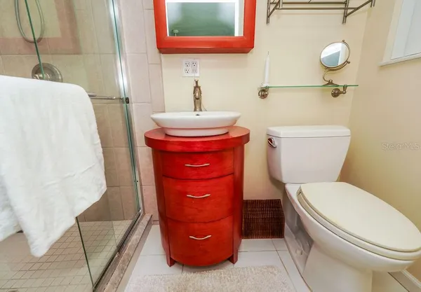 a bathroom with a toilet and a sink
