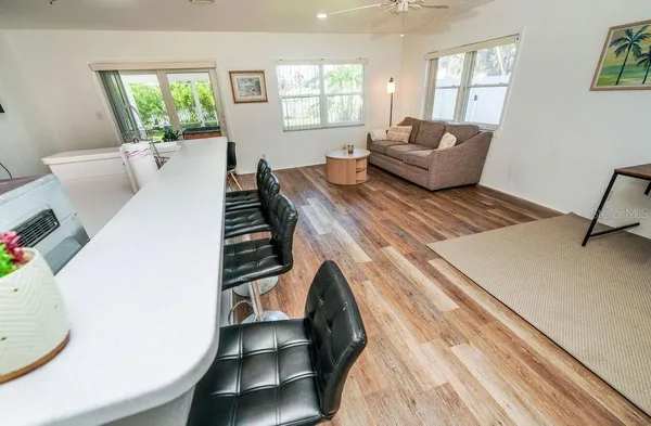 a living room with furniture and a window