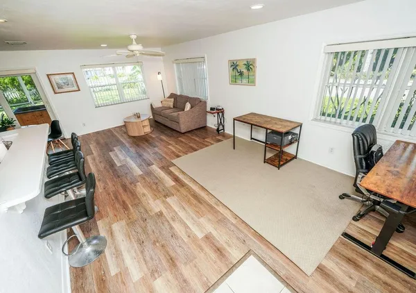 a living room with furniture and a window
