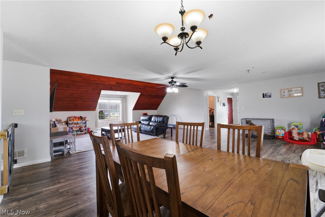3913 Ninevah Road Ashtabula, OH 44004 - Photo 13 of 37 Dining room featuring dark wood-style floors, suspended lighting, and ceiling fan