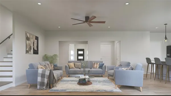 a kitchen with stainless steel appliances granite countertop a refrigerator and a stove top oven