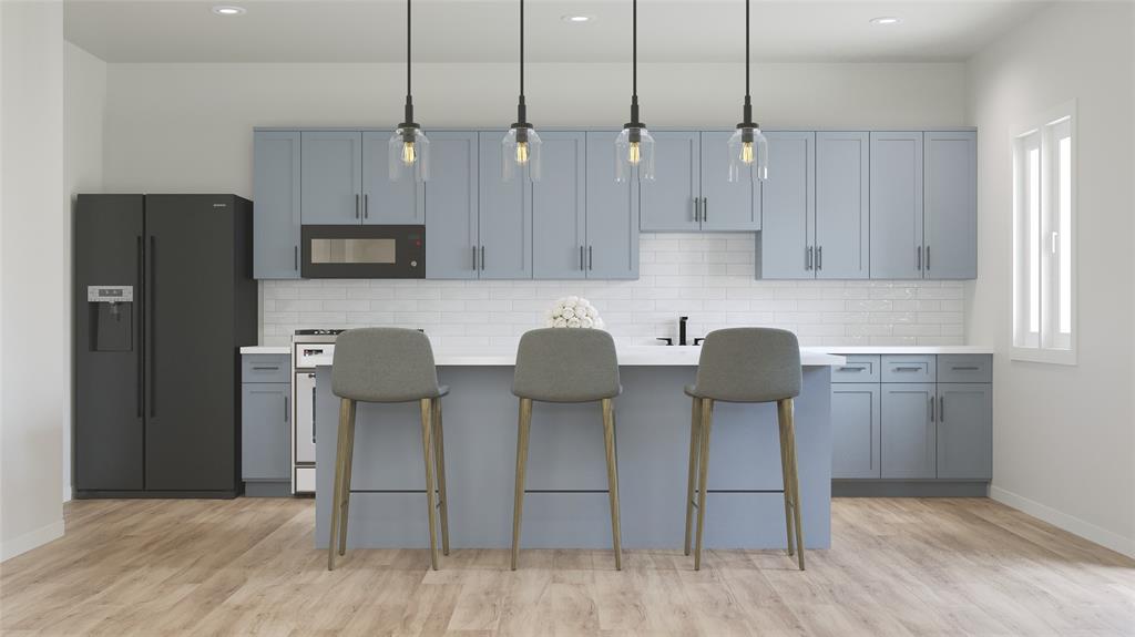 491 Lessie Circle Kennedale, TX 76060 - Photo 6 of 18 a kitchen with stainless steel appliances granite countertop a refrigerator and a stove top oven