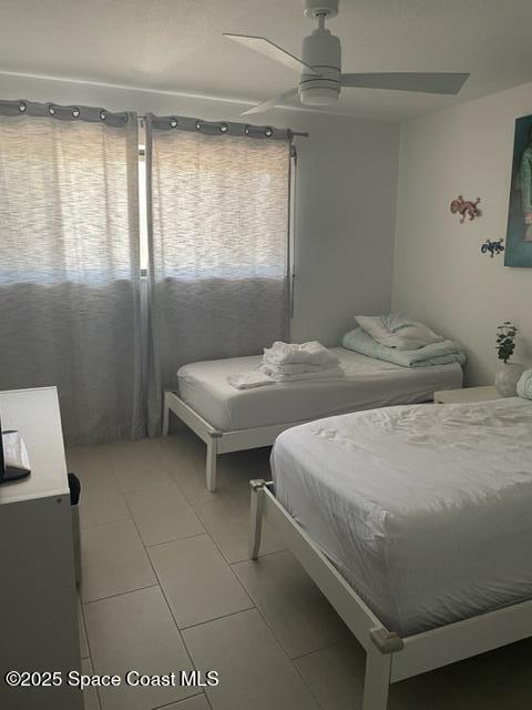 3901 Dixie Highway Northeast, Unit 210 Palm Bay, FL 32905 - Photo 4 of 9 a bedroom with a bed and window