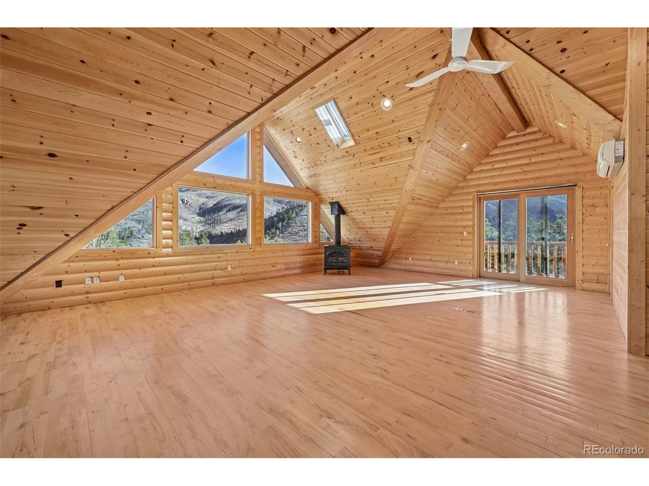 7415 West Highway 24 Cascade, CO 80809 - Photo 21 of 45 a view of an entryway with wooden floor