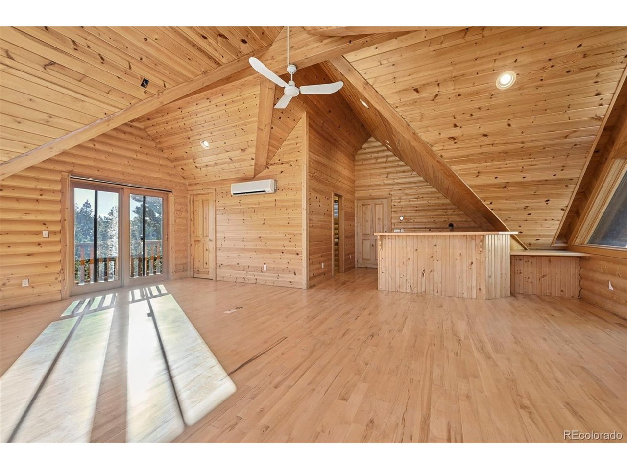 7415 West Highway 24 Cascade, CO 80809 - Photo 24 of 45 a view of house with wooden floor