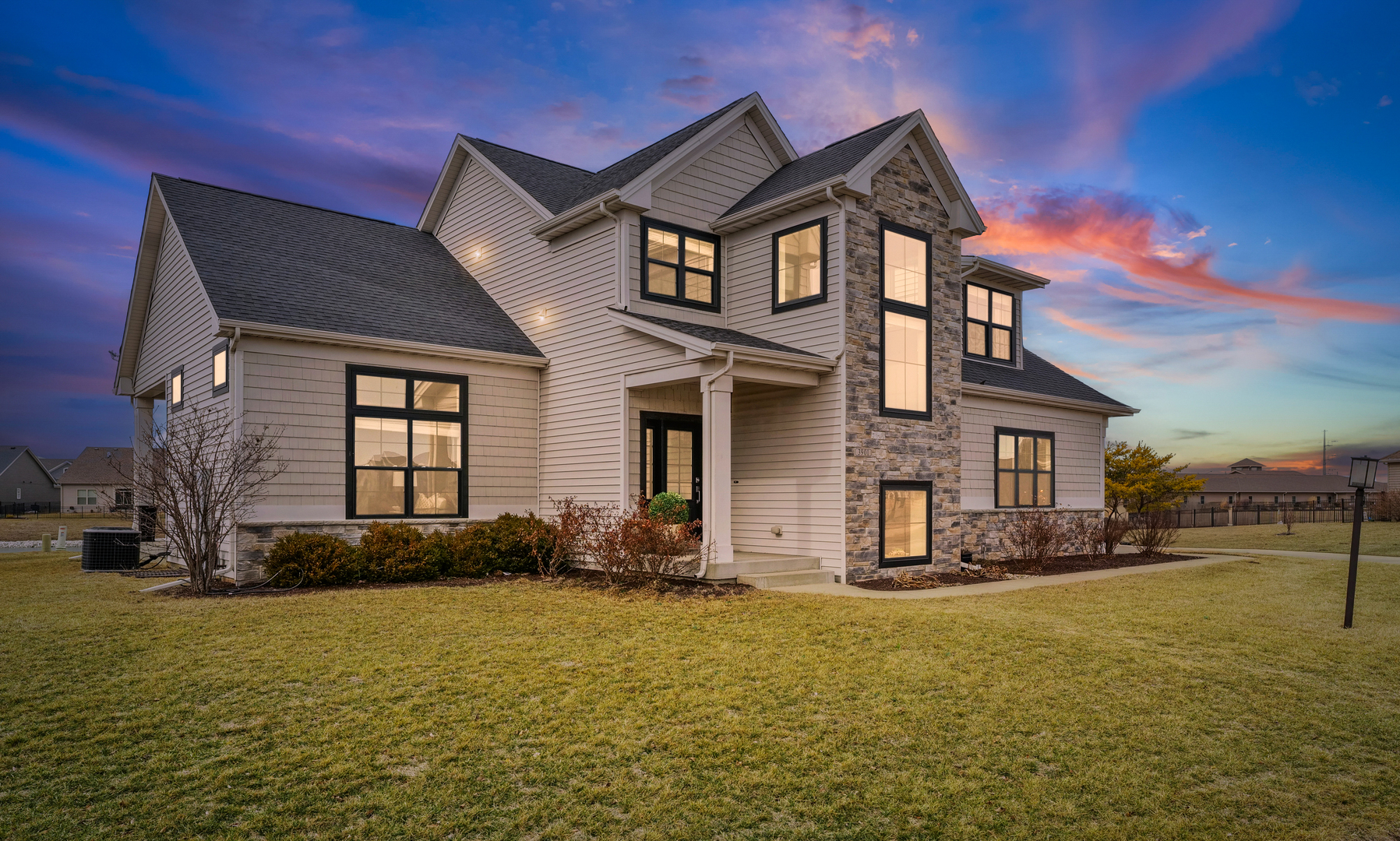 3901 Freedom Boulevard Champaign, IL 61822 - Photo 1 of 55 a front view of a house with a yard