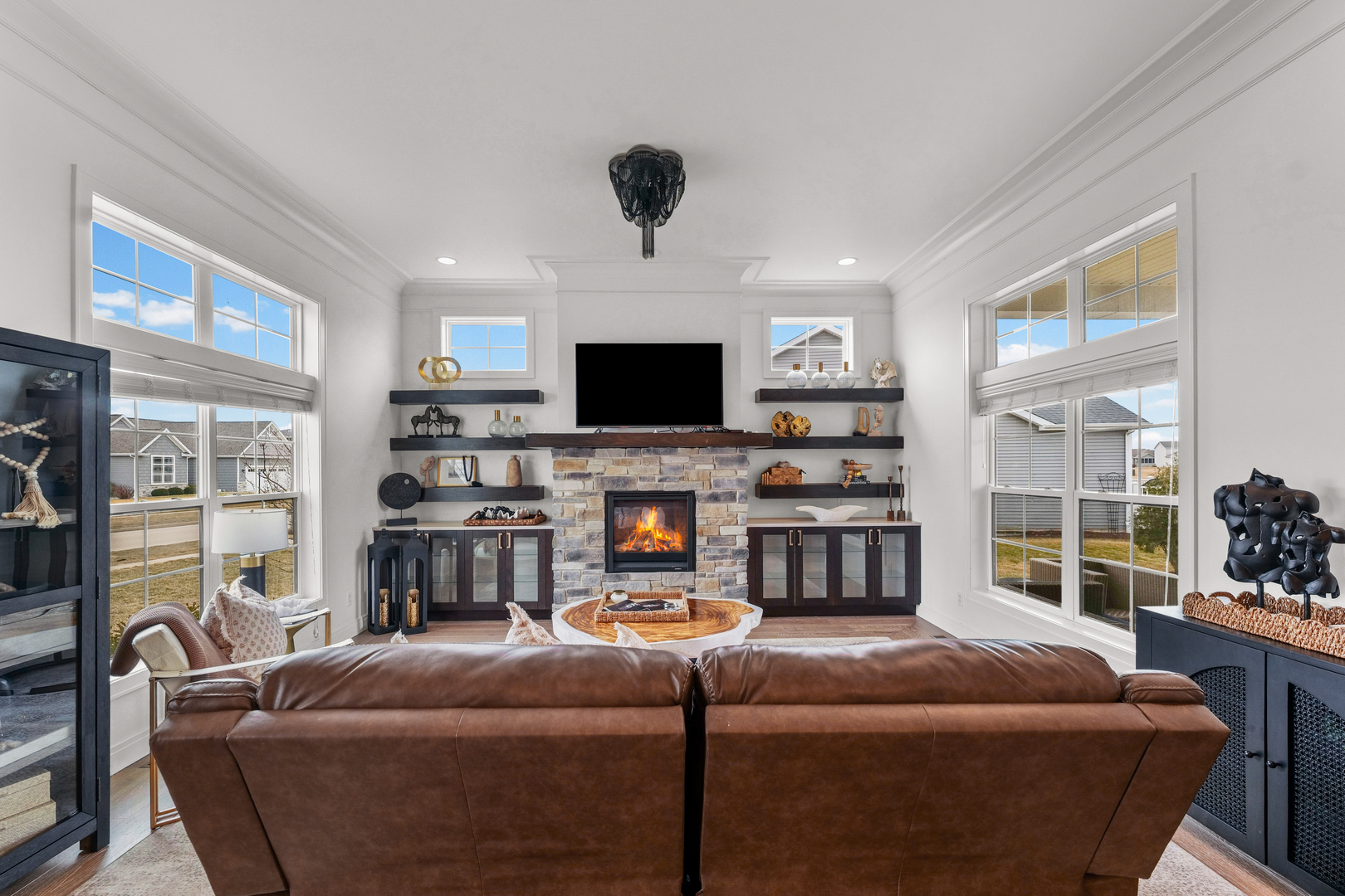 3901 Freedom Boulevard Champaign, IL 61822 - Photo 12 of 55 a living room with fireplace furniture and a flat screen tv