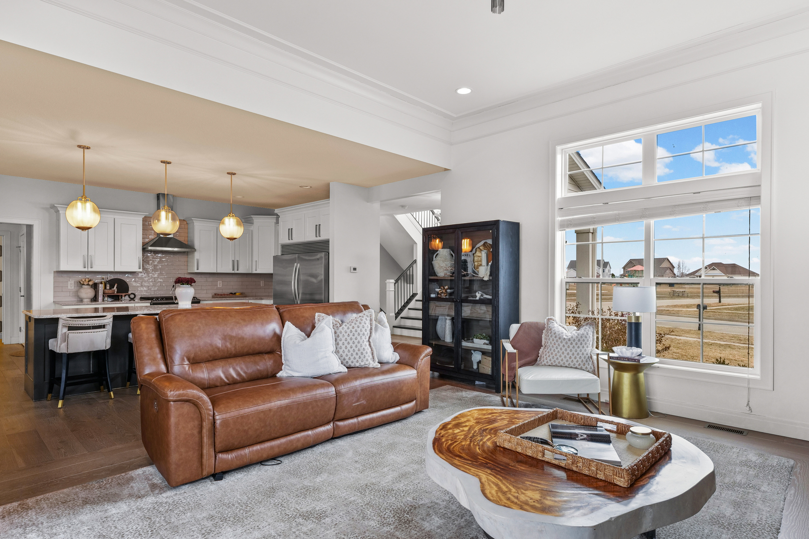 3901 Freedom Boulevard Champaign, IL 61822 - Photo 13 of 55 a living room with furniture and a large window