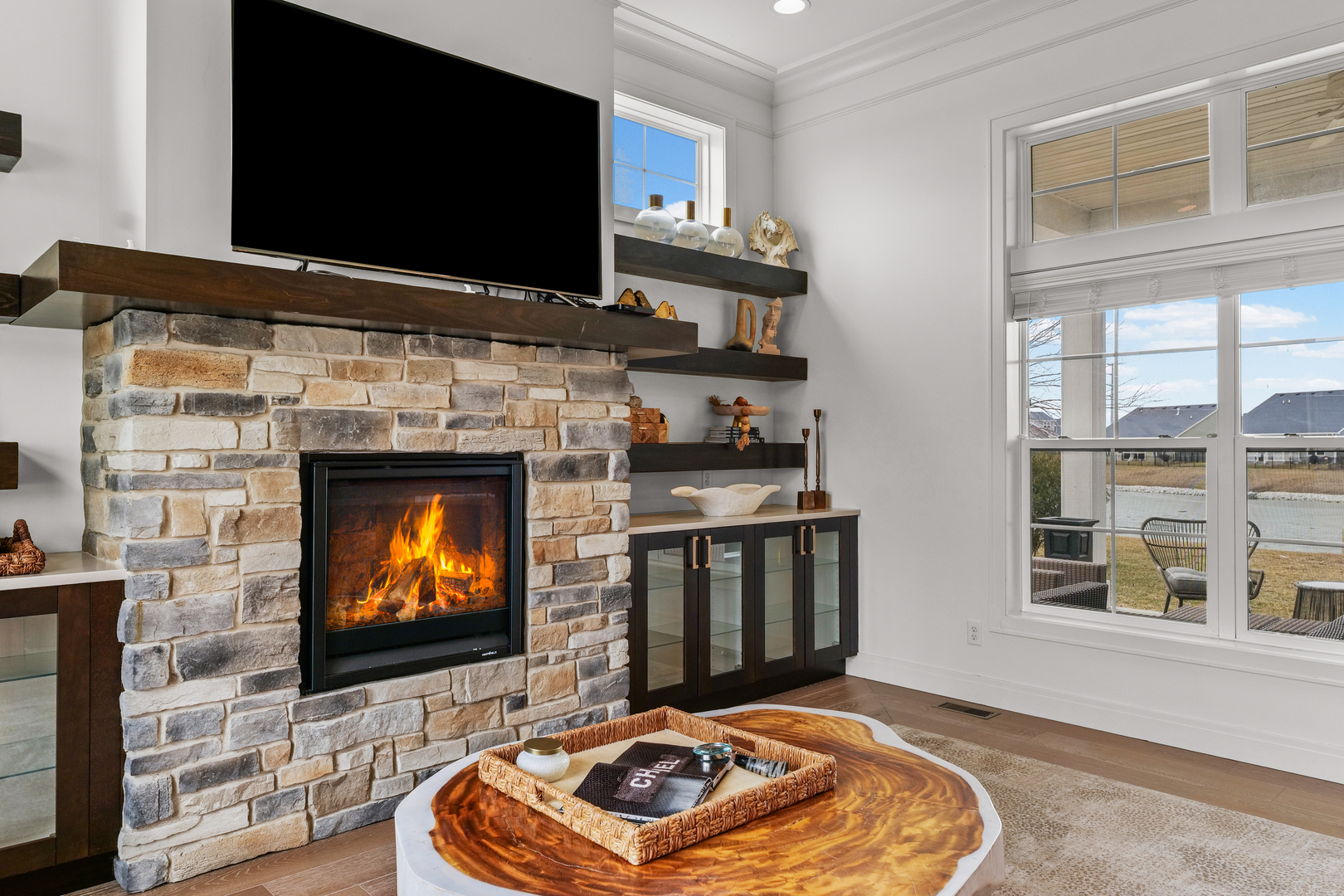 3901 Freedom Boulevard Champaign, IL 61822 - Photo 15 of 55 a living room with fireplace furniture and a flat screen tv