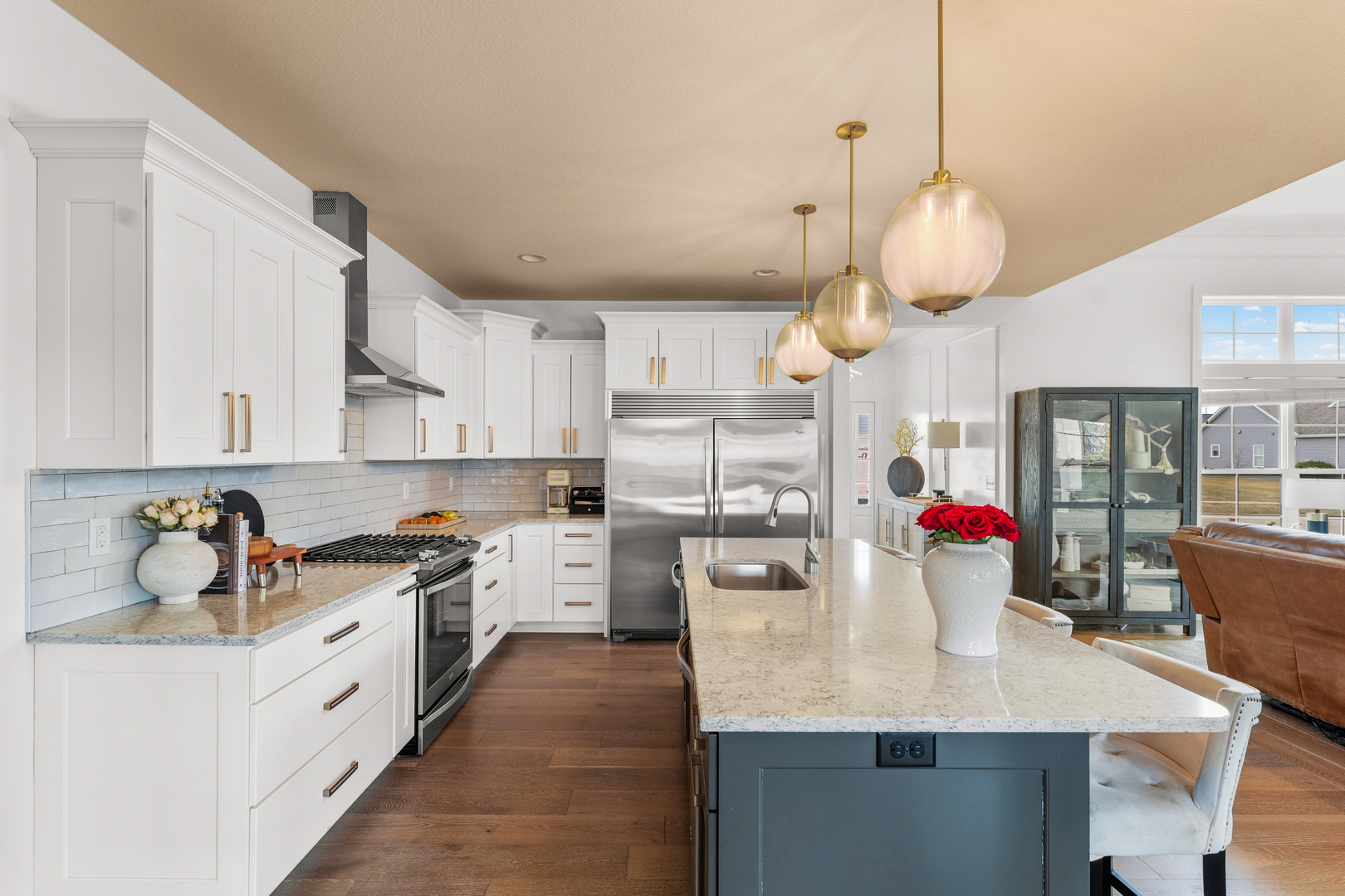 3901 Freedom Boulevard Champaign, IL 61822 - Photo 18 of 55 a kitchen with stainless steel appliances granite countertop a sink a stove oven a counter space and cabinets