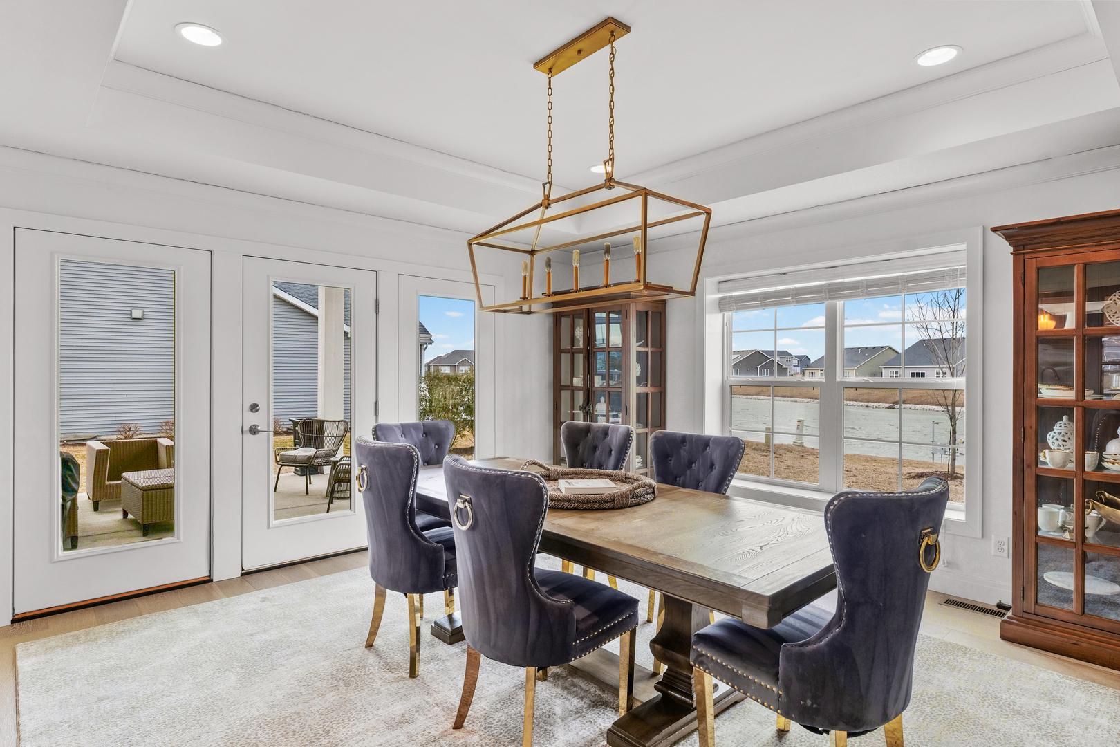 3901 Freedom Boulevard Champaign, IL 61822 - Photo 23 of 55 a view of a dining room with furniture window and wooden floor