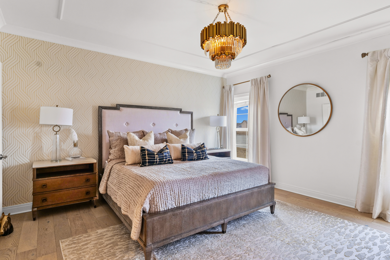 3901 Freedom Boulevard Champaign, IL 61822 - Photo 27 of 55 a bedroom with a bed and a chandelier