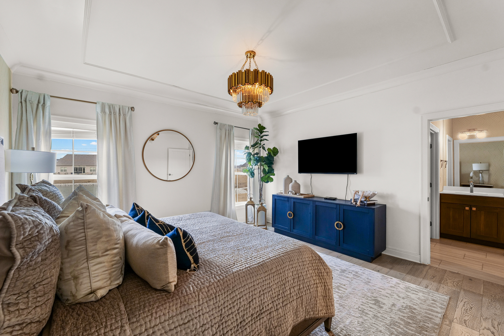 3901 Freedom Boulevard Champaign, IL 61822 - Photo 29 of 55 a bedroom with a bed and a flat screen tv