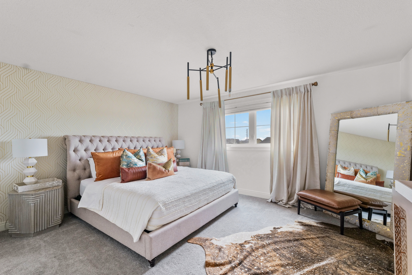 3901 Freedom Boulevard Champaign, IL 61822 - Photo 39 of 55 a bedroom with a bed and a chandelier