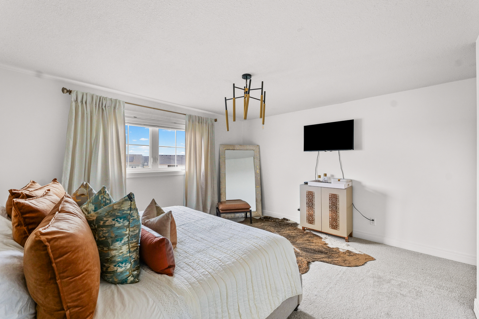 3901 Freedom Boulevard Champaign, IL 61822 - Photo 40 of 55 a bedroom with a bed and flat screen tv