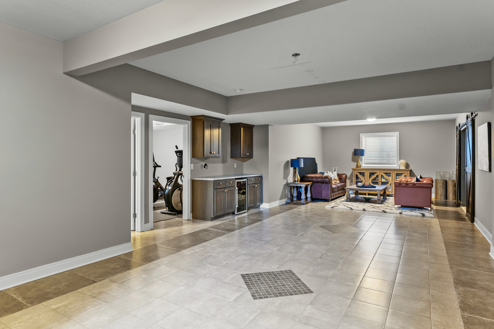 3901 Freedom Boulevard Champaign, IL 61822 - Photo 46 of 55 a living room with furniture and a flat screen tv