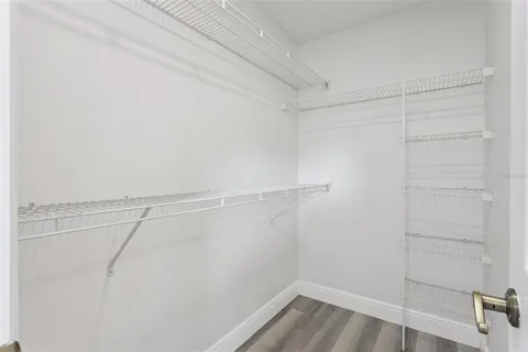 a view of a room with racks on the wall