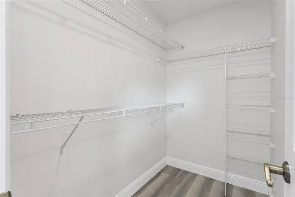 a view of a room with racks on the wall